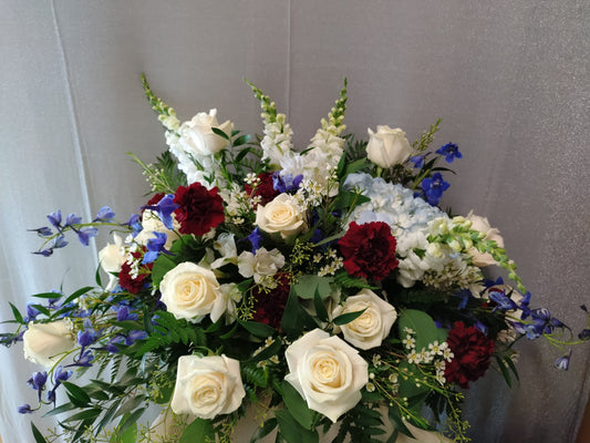 Blue, White and Red Casket Spray